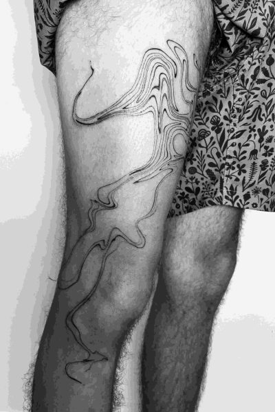 A - Detailed abstact leg tattoo